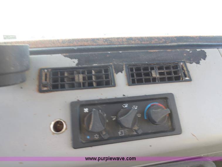 image for item F8078 1995 Freightliner FL70 fertilizer tender truck