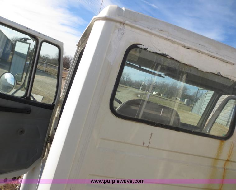 image for item F8078 1995 Freightliner FL70 fertilizer tender truck