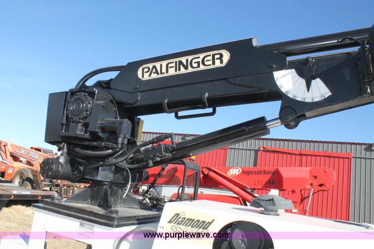 image for item C3673 2004 Ford F550 SuperCab utility truck