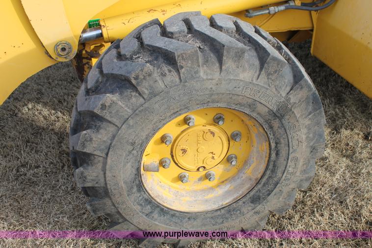 image for item C3676 Komatsu WB140-2N backhoe