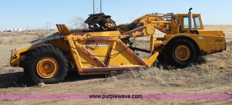 image for item C3696 John Deere 860 scraper
