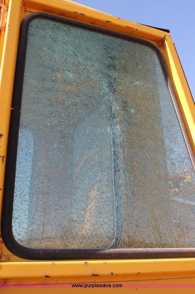 image for item C3696 John Deere 860 scraper