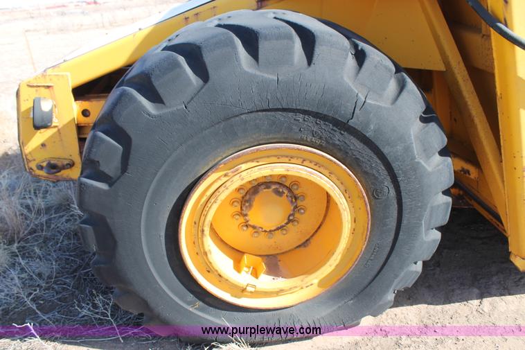 image for item C3696 John Deere 860 scraper