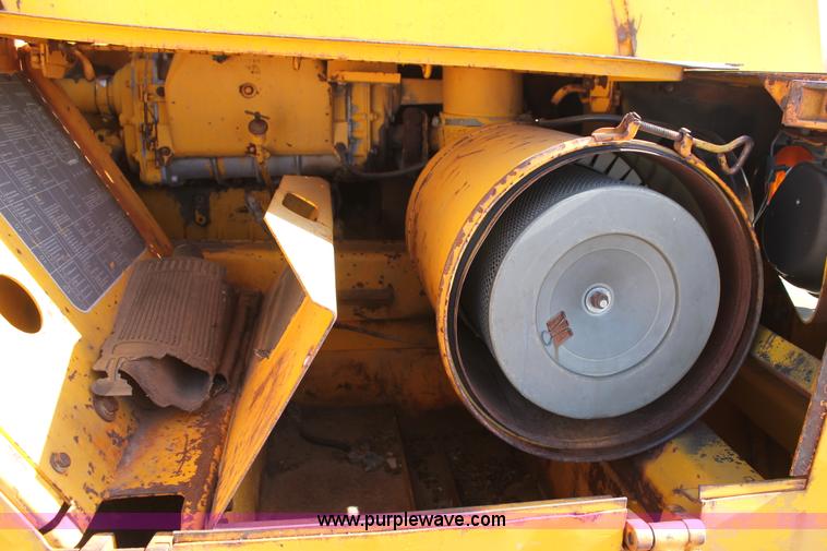 image for item C3696 John Deere 860 scraper