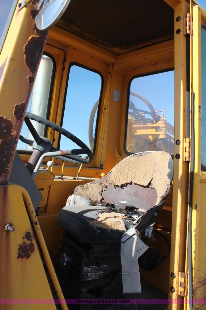 image for item C3696 John Deere 860 scraper