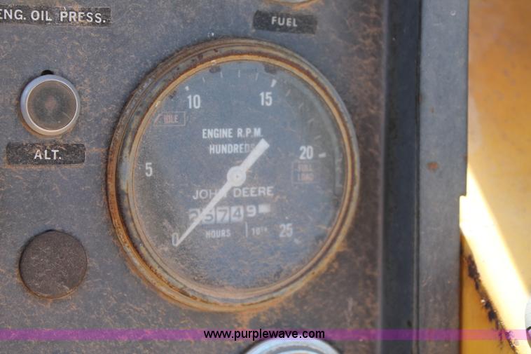 image for item C3696 John Deere 860 scraper