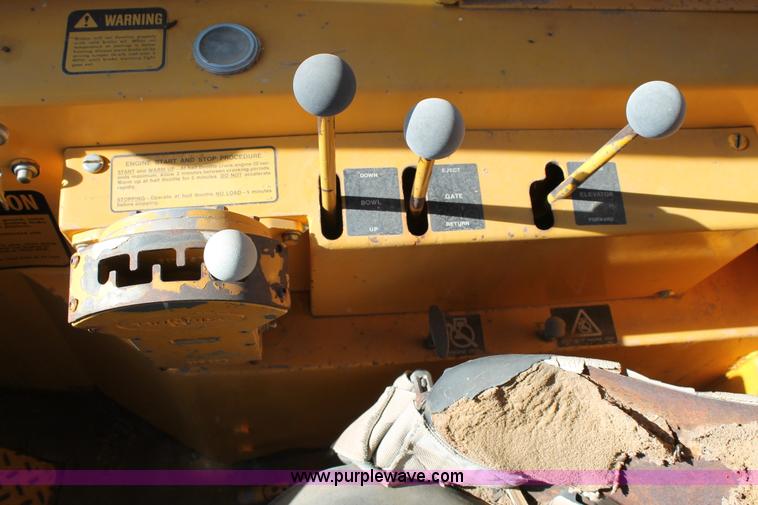 image for item C3696 John Deere 860 scraper