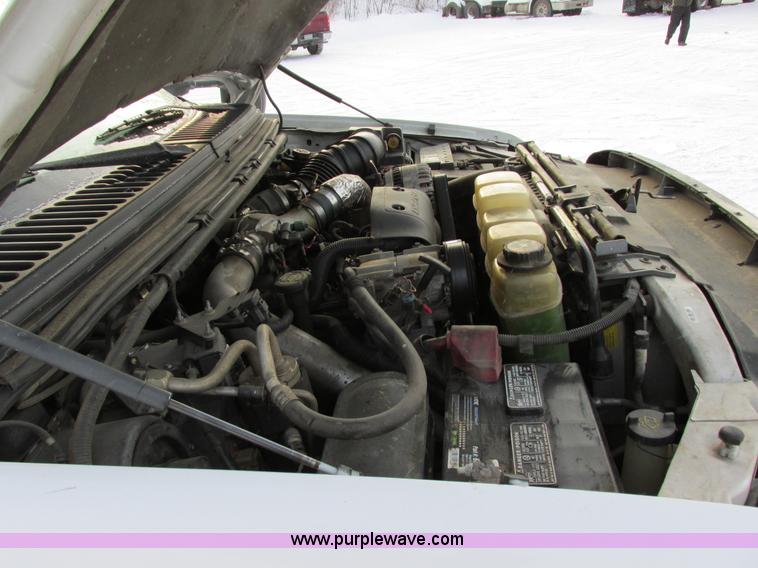 image for item E5250 2000 Ford F450 Super Duty XL utility truck