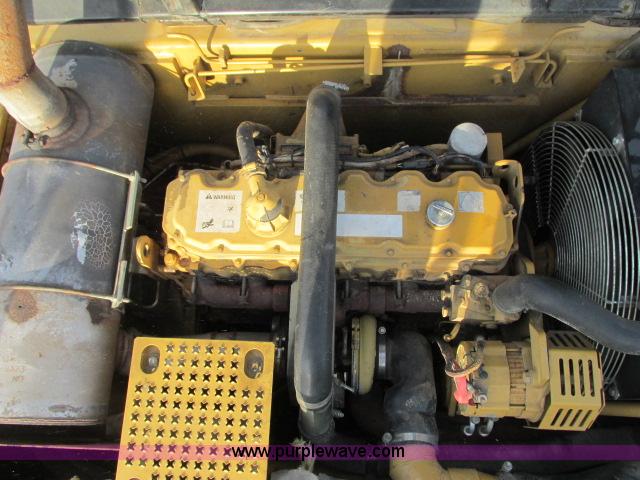 image for item G8899 2002 Caterpillar 325C L excavator