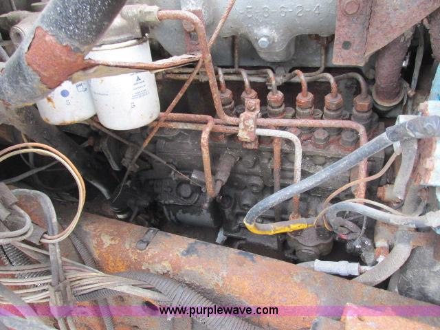 image for item G8908 1988 Ford F800 flatbed truck