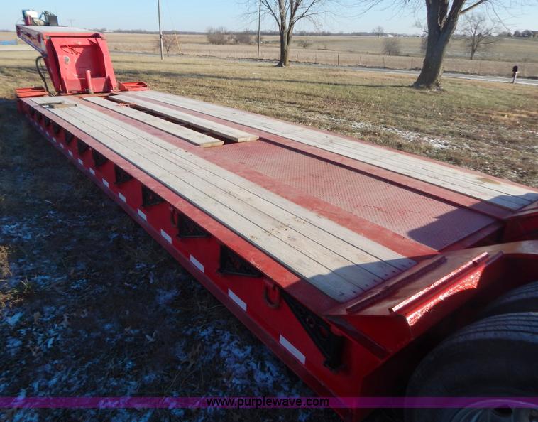image for item H3920 1999 Talbert triple axle lowboy trailer with stinger