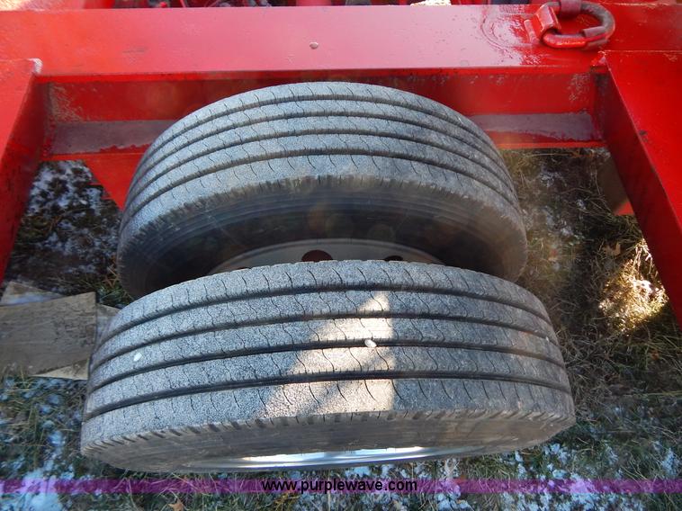 image for item H3920 1999 Talbert triple axle lowboy trailer with stinger