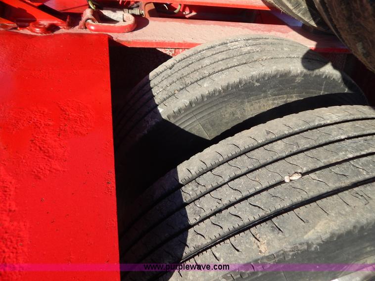 image for item H3920 1999 Talbert triple axle lowboy trailer with stinger