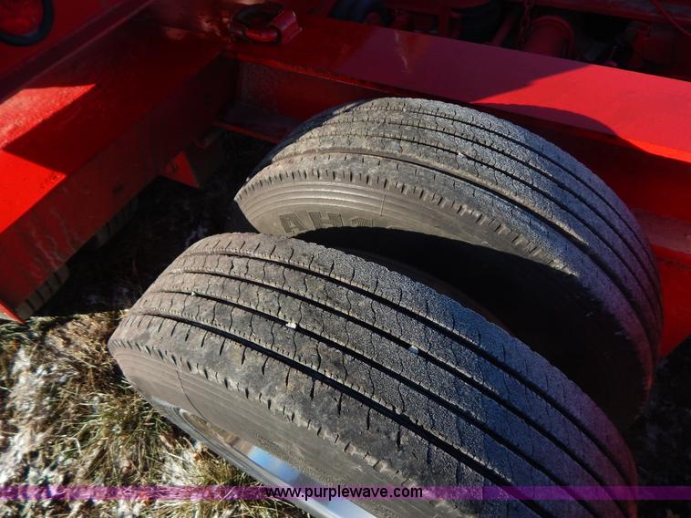 image for item H3920 1999 Talbert triple axle lowboy trailer with stinger