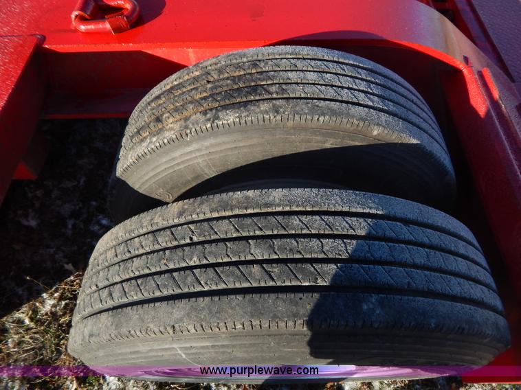 image for item H3920 1999 Talbert triple axle lowboy trailer with stinger