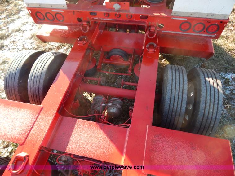 image for item H3920 1999 Talbert triple axle lowboy trailer with stinger