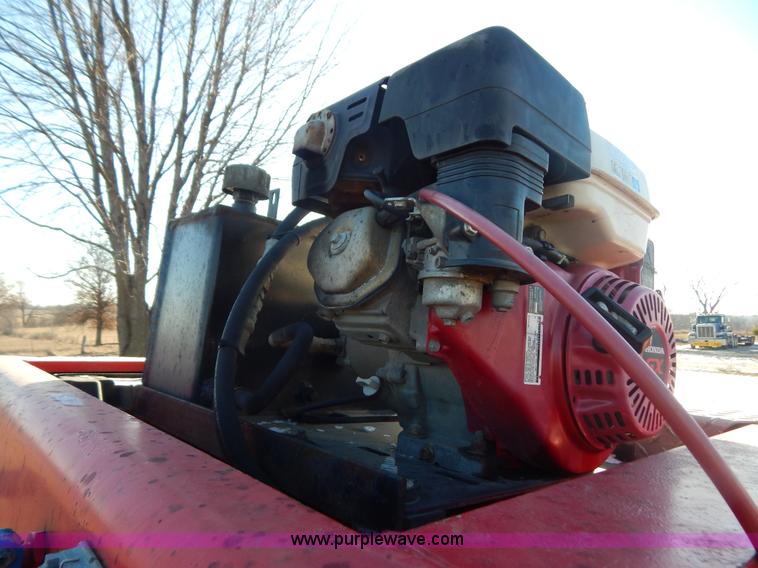 image for item H3920 1999 Talbert triple axle lowboy trailer with stinger