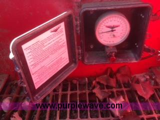 image for item H3920 1999 Talbert triple axle lowboy trailer with stinger