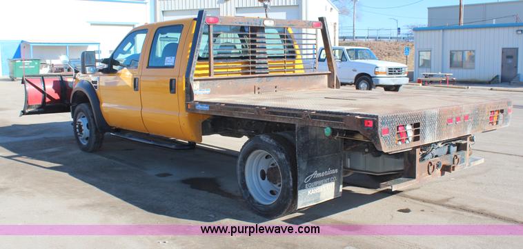 image for item H7760 2008 Ford F450 Super Duty XL Crew Cab flatbed truck