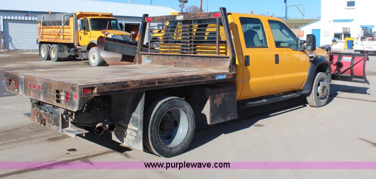 image for item H7760 2008 Ford F450 Super Duty XL Crew Cab flatbed truck