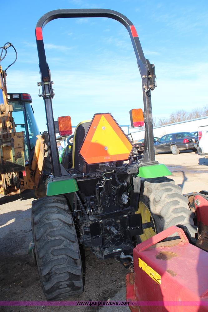 image for item H7812 2007 John Deere 2320 MFWD utility tractor