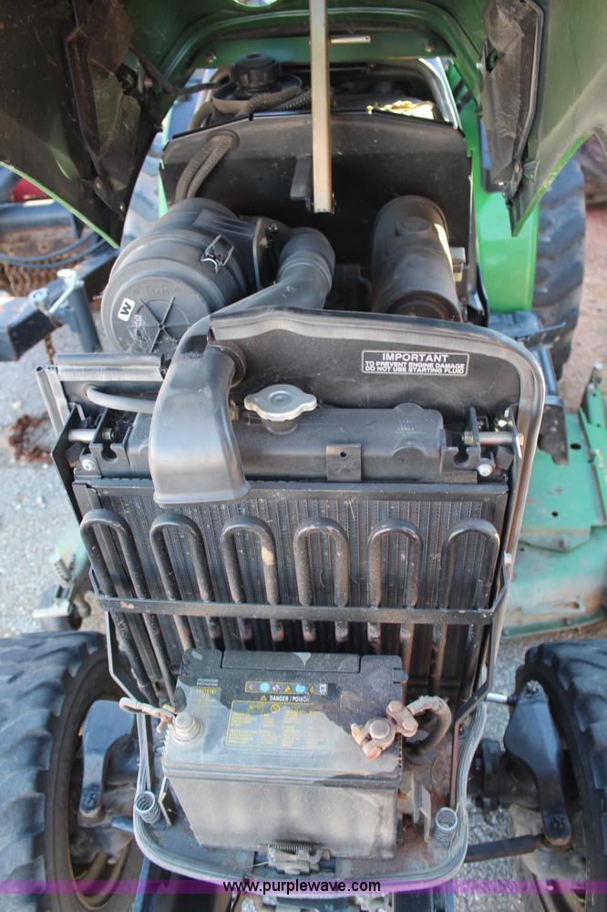 image for item H7812 2007 John Deere 2320 MFWD utility tractor