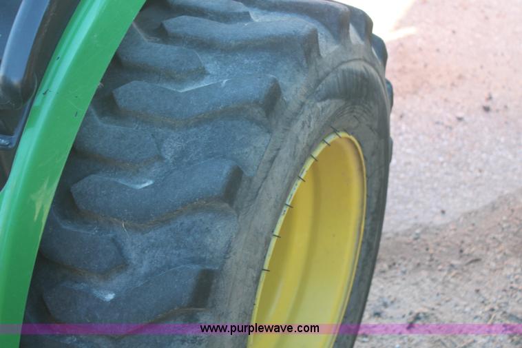 image for item H7812 2007 John Deere 2320 MFWD utility tractor