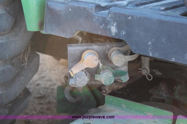 image for item H7812 2007 John Deere 2320 MFWD utility tractor