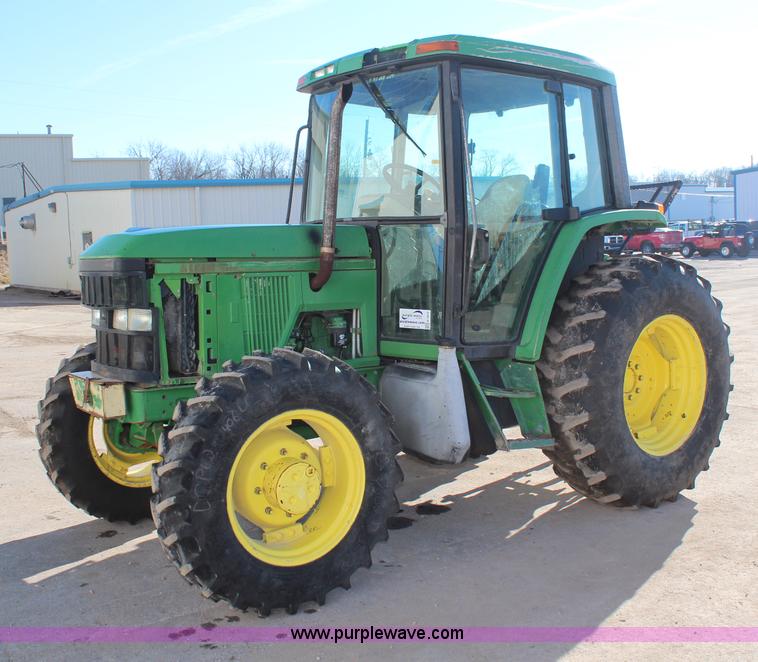 image for item H7815 2000 John Deere 6410 MFWD tractor