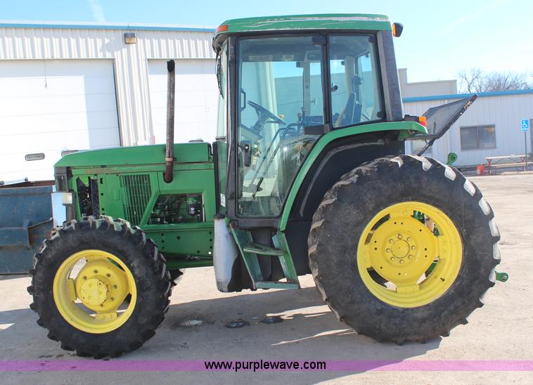 image for item H7815 2000 John Deere 6410 MFWD tractor