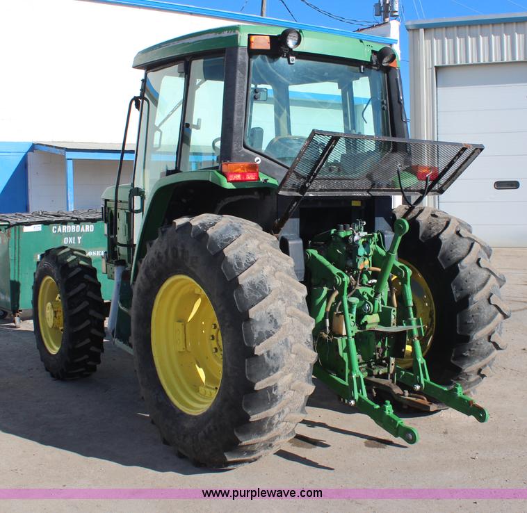 image for item H7815 2000 John Deere 6410 MFWD tractor