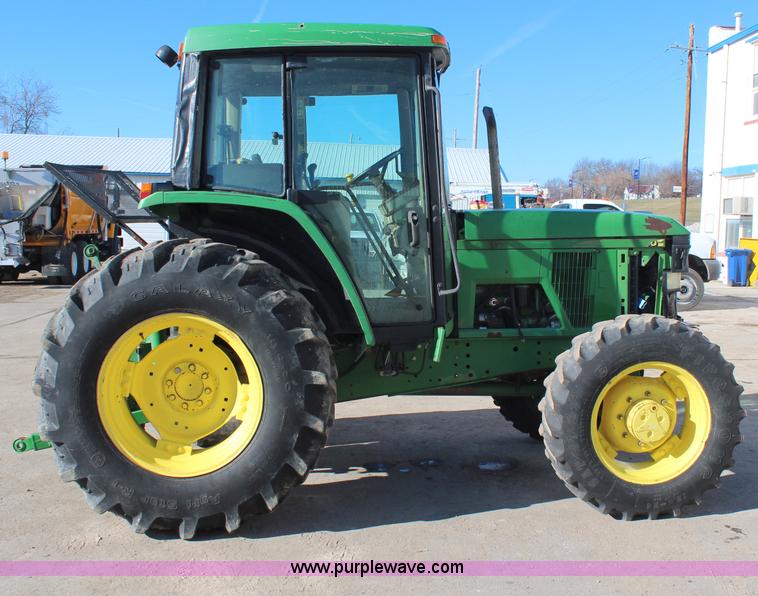image for item H7815 2000 John Deere 6410 MFWD tractor
