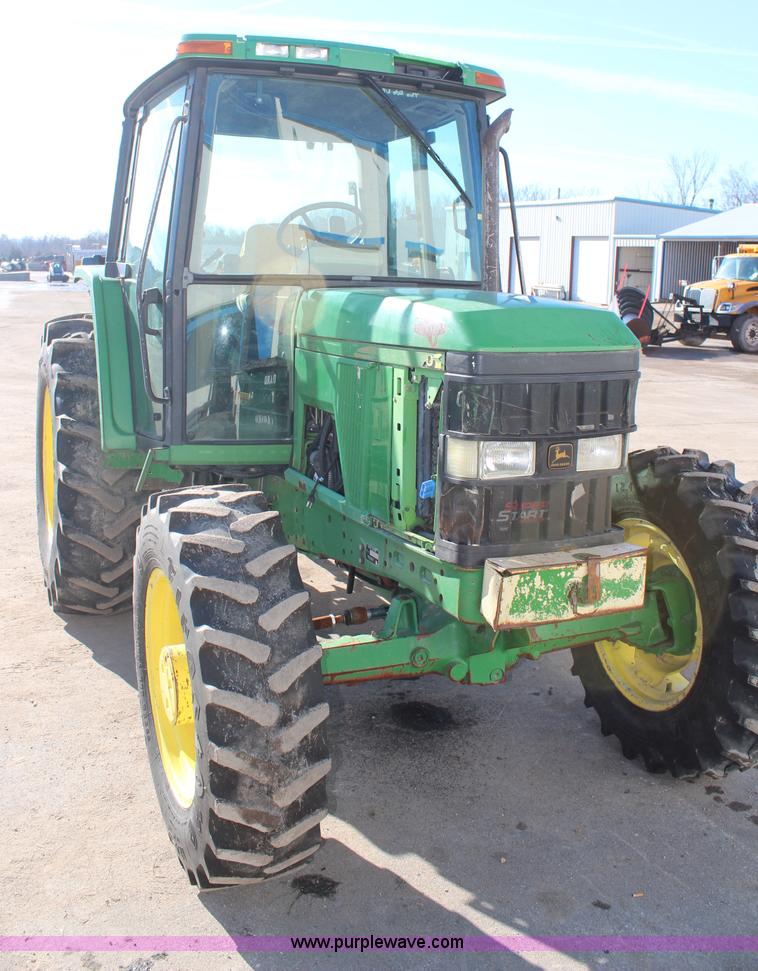 image for item H7815 2000 John Deere 6410 MFWD tractor