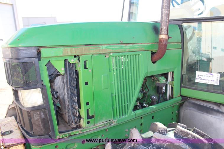 image for item H7815 2000 John Deere 6410 MFWD tractor