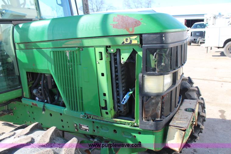 image for item H7815 2000 John Deere 6410 MFWD tractor