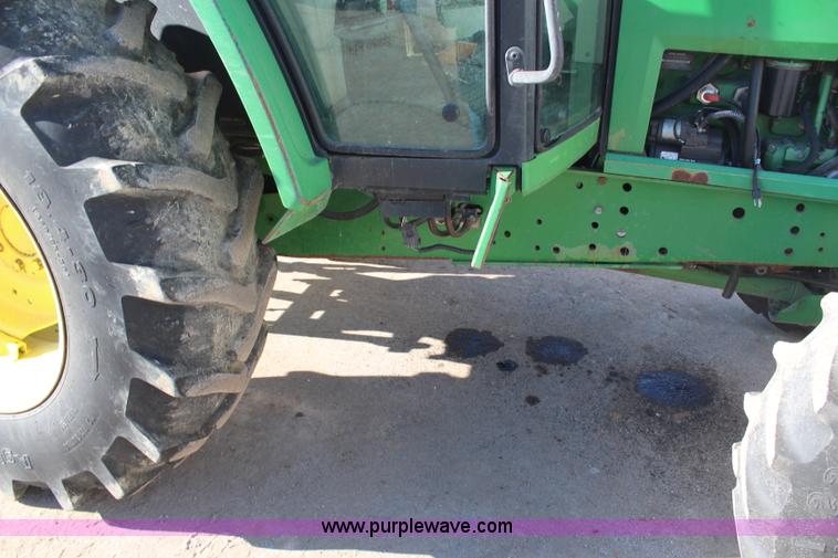 image for item H7815 2000 John Deere 6410 MFWD tractor