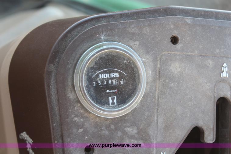 image for item H7815 2000 John Deere 6410 MFWD tractor