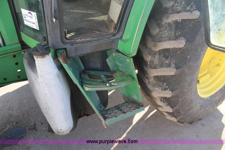 image for item H7815 2000 John Deere 6410 MFWD tractor