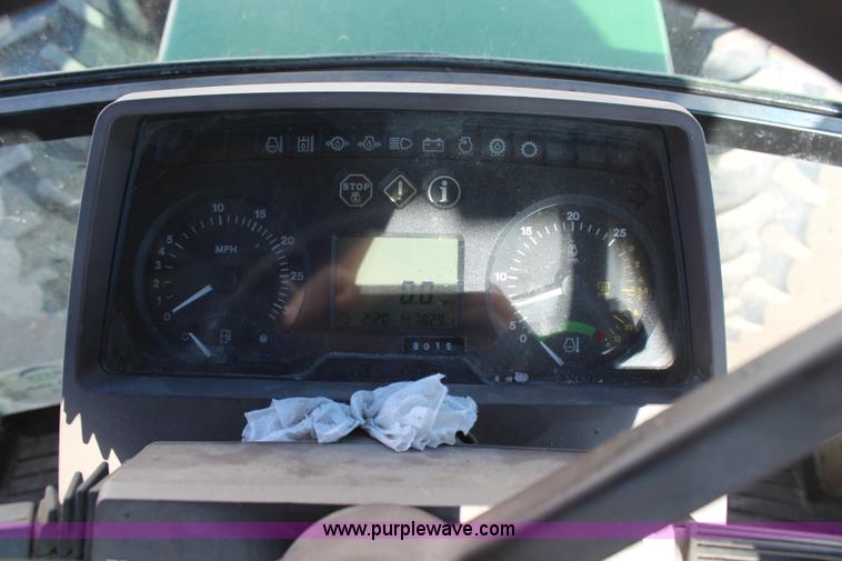 image for item H7815 2000 John Deere 6410 MFWD tractor