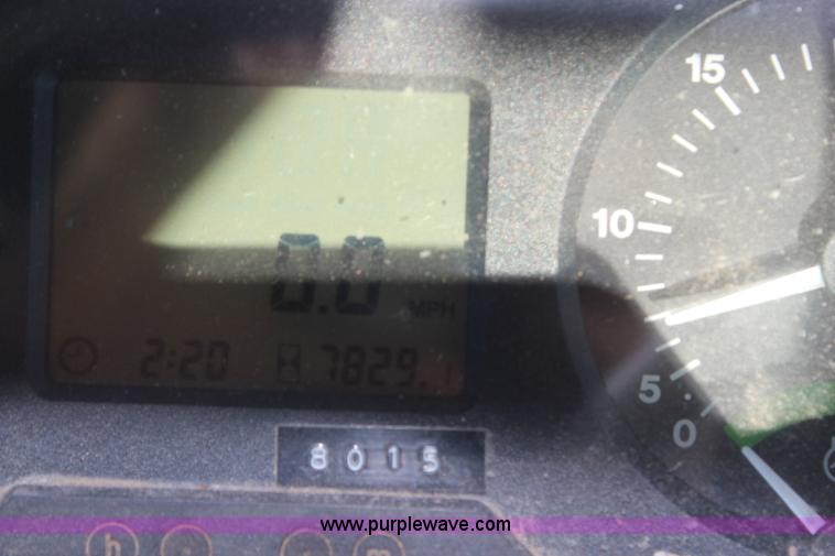 image for item H7815 2000 John Deere 6410 MFWD tractor