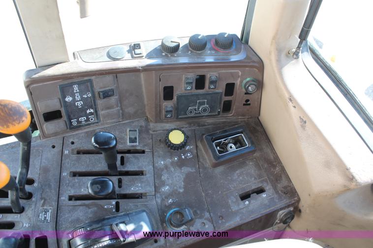 image for item H7815 2000 John Deere 6410 MFWD tractor