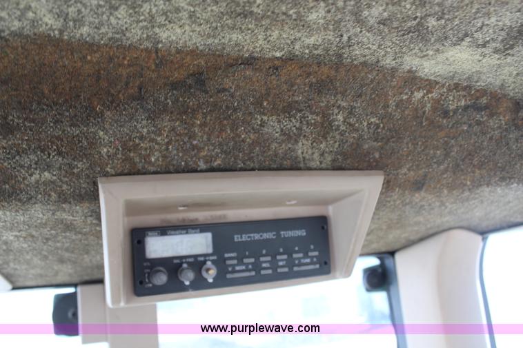 image for item H7815 2000 John Deere 6410 MFWD tractor