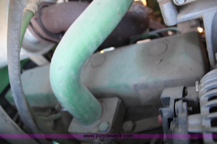 image for item H7815 2000 John Deere 6410 MFWD tractor