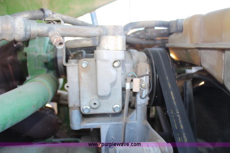 image for item H7815 2000 John Deere 6410 MFWD tractor