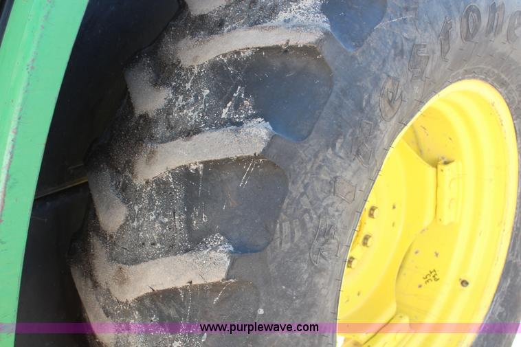 image for item H7815 2000 John Deere 6410 MFWD tractor