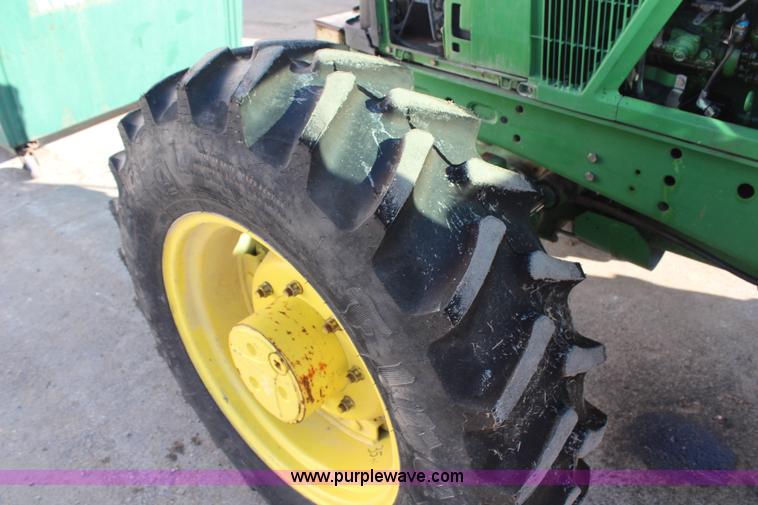 image for item H7815 2000 John Deere 6410 MFWD tractor
