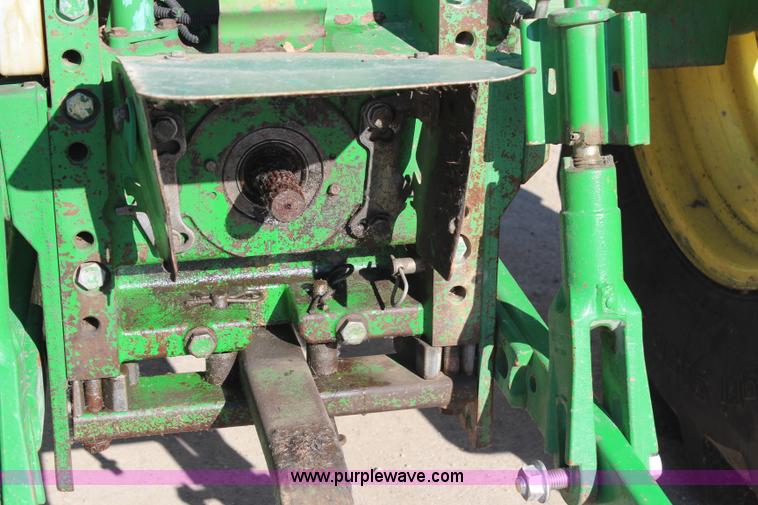 image for item H7815 2000 John Deere 6410 MFWD tractor