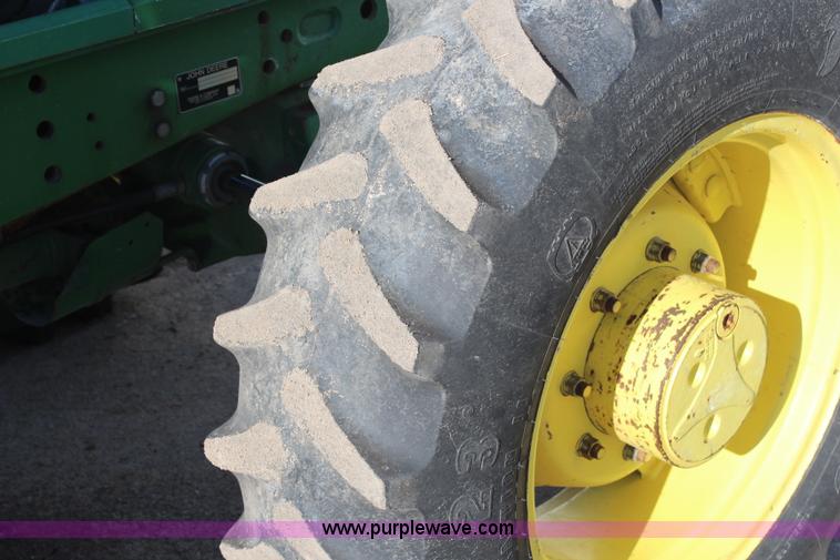 image for item H7815 2000 John Deere 6410 MFWD tractor