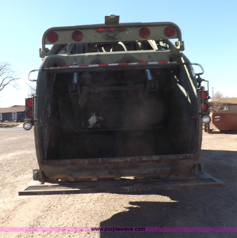 image for item I9217 1992 Volvo WX64 trash truck