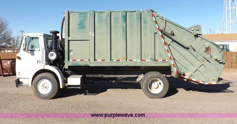 image for item I9217 1992 Volvo WX64 trash truck